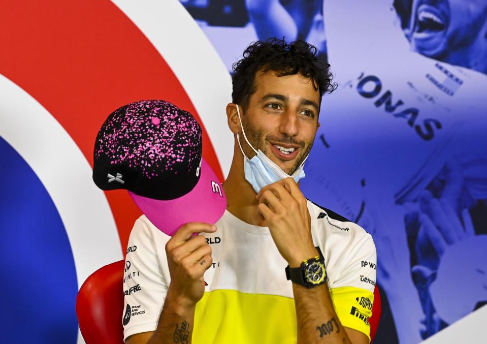 FILE - In this Thursday, Aug. 6, 2020 file photo, Renault driver Daniel Ricciardo of Australia attends the press conference in the build-up to the 70th Anniversary Formula One Grand Prix at the Silverstone circuit, Silverstone, England. The new season starts Sunday March 28, 2021 with the Bahrain Grand Prix and ends in December 2021 at Abu Dhabi. (Mark Sutton/Pool via AP, File)