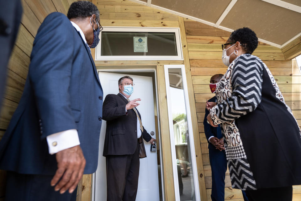 From left, Rep. Emanuel Cleaver, Kansas City Mayor Quinton Lucas and Secretary Marcia Fudge tour a sustainable home in Kansas City, Mo. (U.S. Department of Housing and Urban Development)