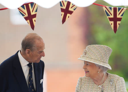 FILE PHOTO: Britain's Queen Elizabeth and Prince Philip visit Pangbourne College near Reading, May 9, 2017. REUTERS/Toby Melville/File Photo