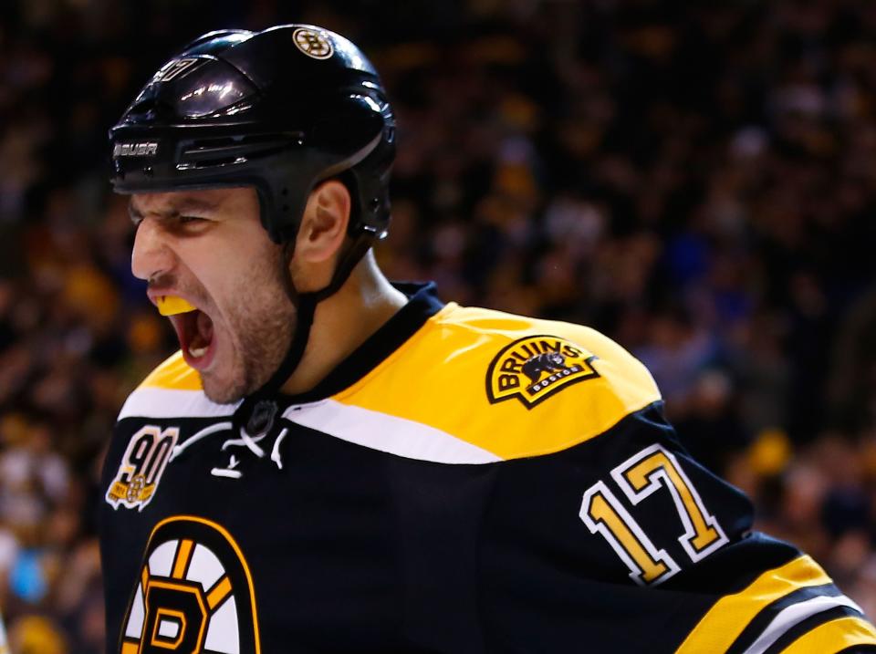 BOSTON, MA - APRIL 26:  Milan Lucic #17 of the Boston Bruins celebrates his goal against the Detroit Red Wings in the third period in Game Five of the First Round of the 2014 NHL Stanley Cup Playoffs at TD Garden on April 26, 2014 in Boston, Massachusetts. (Photo by Jared Wickerham)  (Photo by Jared Wickerham/Getty Images)
