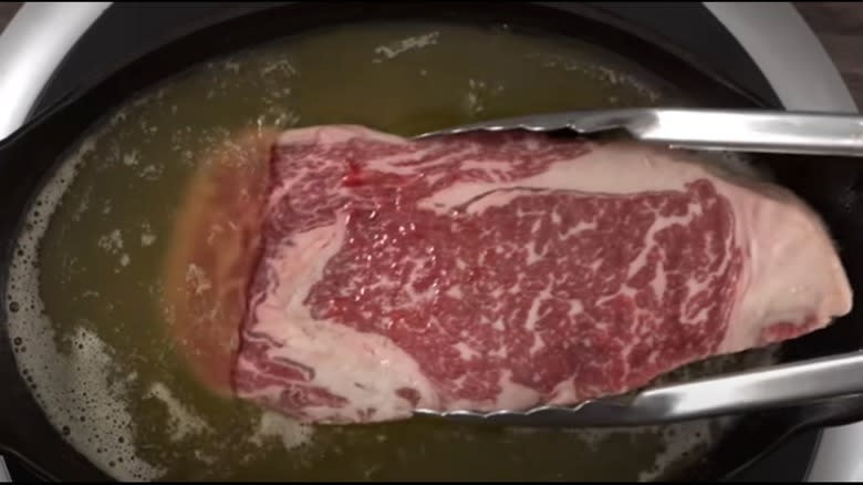 deep-frying steak in bone marrow