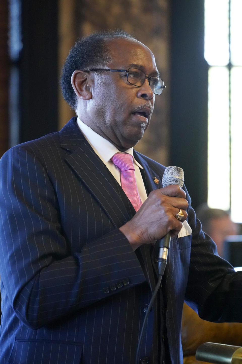 Sen. Albert Butler, D-Port Gibson, asks a question about legislation that would reduce the state income tax over four years, during floor debate, Sunday, March 27, 2022, at the Mississippi Capitol in Jackson. The legislation passed both chambers. (AP Photo/Rogelio V. Solis)