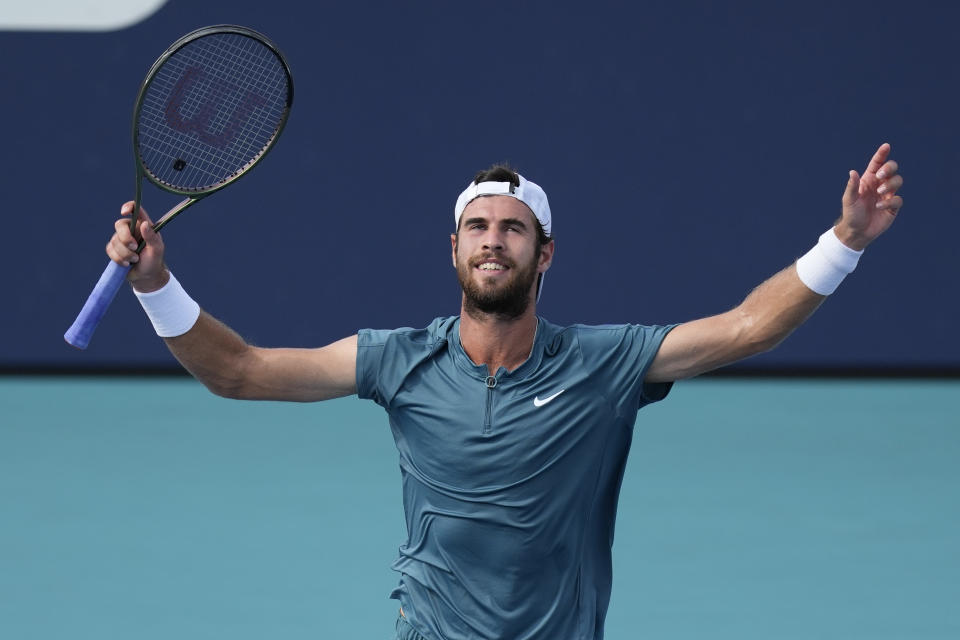 Karen Khachanov celebrates winning his quarterfinal match over Francisco Cerundolo of Argentina, during the Miami Open tennis tournament, Thursday, March 30, 2023, in Miami Gardens, Fla. (AP Photo/Rebecca Blackwell)