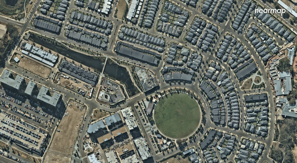 The image from April 2018 shows the completed construction with rows of identical homes. Photo: Nearmap.com.au