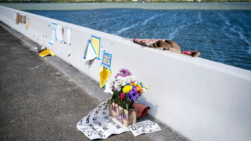 Flowers and messages, pictured here on the Teodoro Moscoso Bridge where the body of Keishla Rodriguez was dumped.