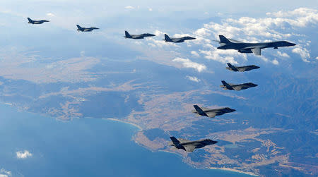 FILE PHOTO: U.S. Air Force B-1B bomber flies in formation during a joint aerial drill called 'Vigilant Ace' between U.S. and South Korea, South Korea. Picture taken December 6, 2017. The Defense Ministry/Yonhap via REUTERS