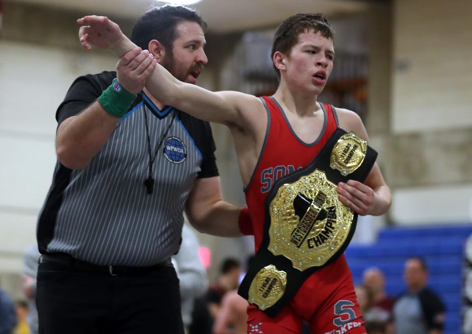 Somers Ryan Ball and Pleasantville's Jesse Straus wrestle in the 116-pound weight class during the Westchester County wrestling championship at Yonkers High School Jan. 20, 2024. Ball won the match.