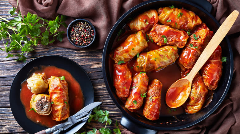 Cabbage rolls in pan and on plate