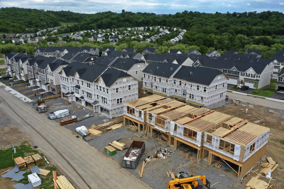  Houses under construction are seen in Mars, Pa., on May, 27, 2022. Homebuilders have pumped the brakes on new single-family home construction this year, a trend that’s likely to extend into 2023, according to several forecasts. (AP Photo/Gene J. Puskar, File)