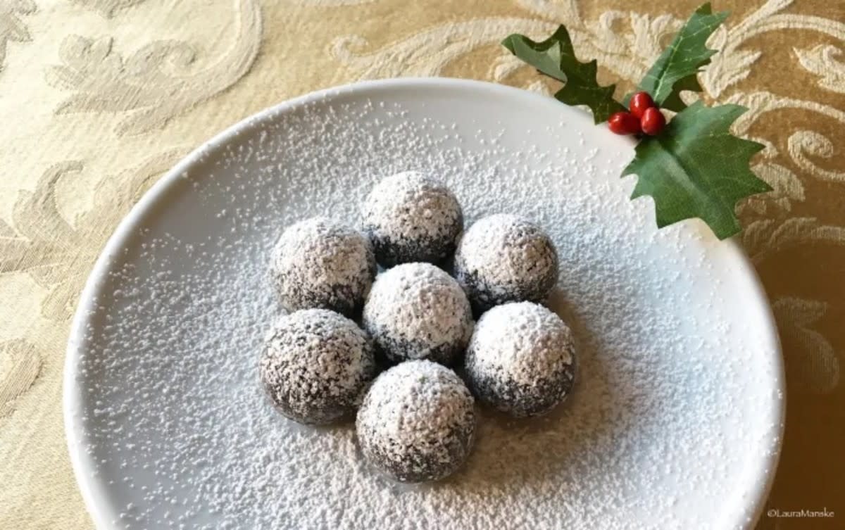 <p>Laura Manske</p><p>Just like grandma used to make, but easier.</p><p><strong>Get the recipe: <a href="https://parade.com/842024/lauramanske/holiday-favorite-no-bake-chocolate-rum-balls-more/" rel="nofollow noopener" target="_blank" data-ylk="slk:No-Bake Chocolate Rum Balls;elm:context_link;itc:0;sec:content-canvas" class="link rapid-noclick-resp">No-Bake Chocolate Rum Balls</a></strong></p>