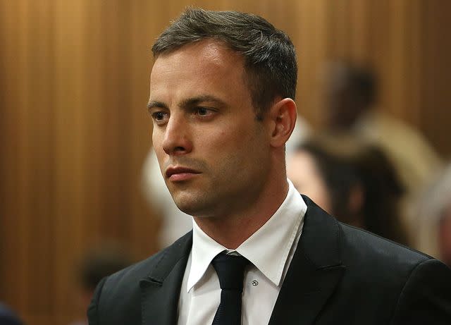 <p>Alon Skuy/The Times/Gallo Images/Getty</p> Oscar Pistorius attends his sentencing hearing in the Pretoria High Court on October 16, 2014.