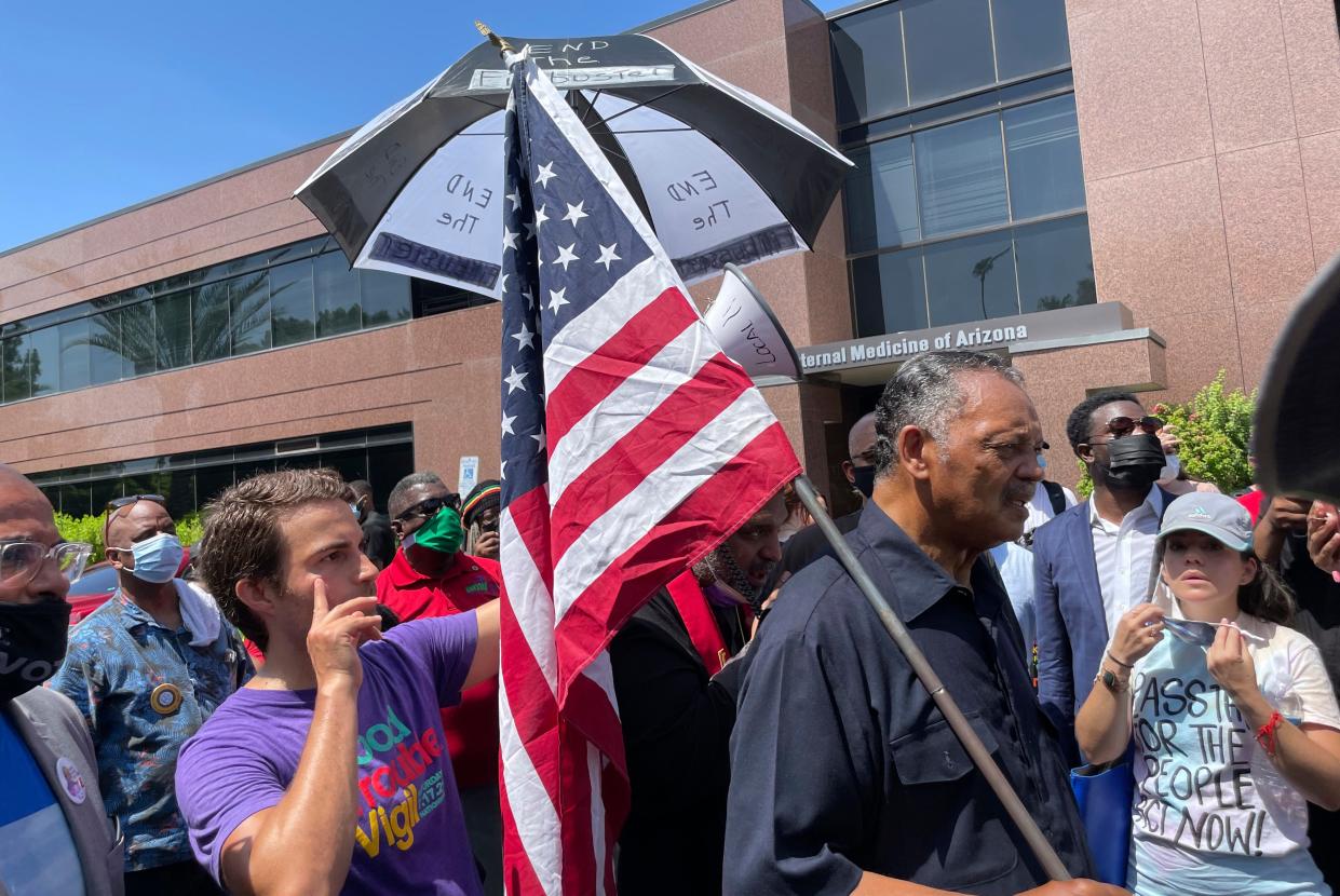 Sinema Protest (Copyright 2021 The Associated Press. All rights reserved.)