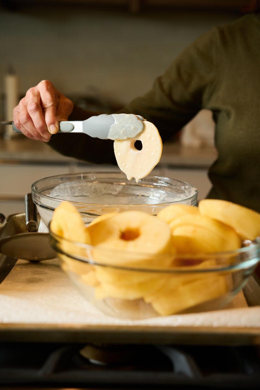 apple fritters being prepared