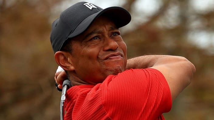 Tiger Woods hits his tee shot on the 15th hole during the final round of the PNC Championship last December at the Ritz Carlton Golf Club in Orlando, Florida. (Photo: Mike Ehrmann/Getty Images)