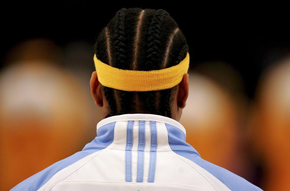 Iverson of the Denver Nuggets stands for the national anthem before a game with the Los Angeles Lakers on Jan. 5, 2007. (Photo: Stephen Dunn via Getty Images)