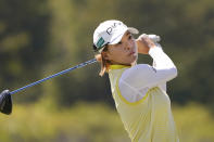 Hinako Shibuno, of Japan, watches he tee shot on the 10th hole during the LPGA The Ascendant golf tournament in The Colony, Texas, Thursday, Sept. 29, 2022. (AP Photo/LM Otero)