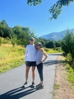 Amy Hardison with husband_hiking