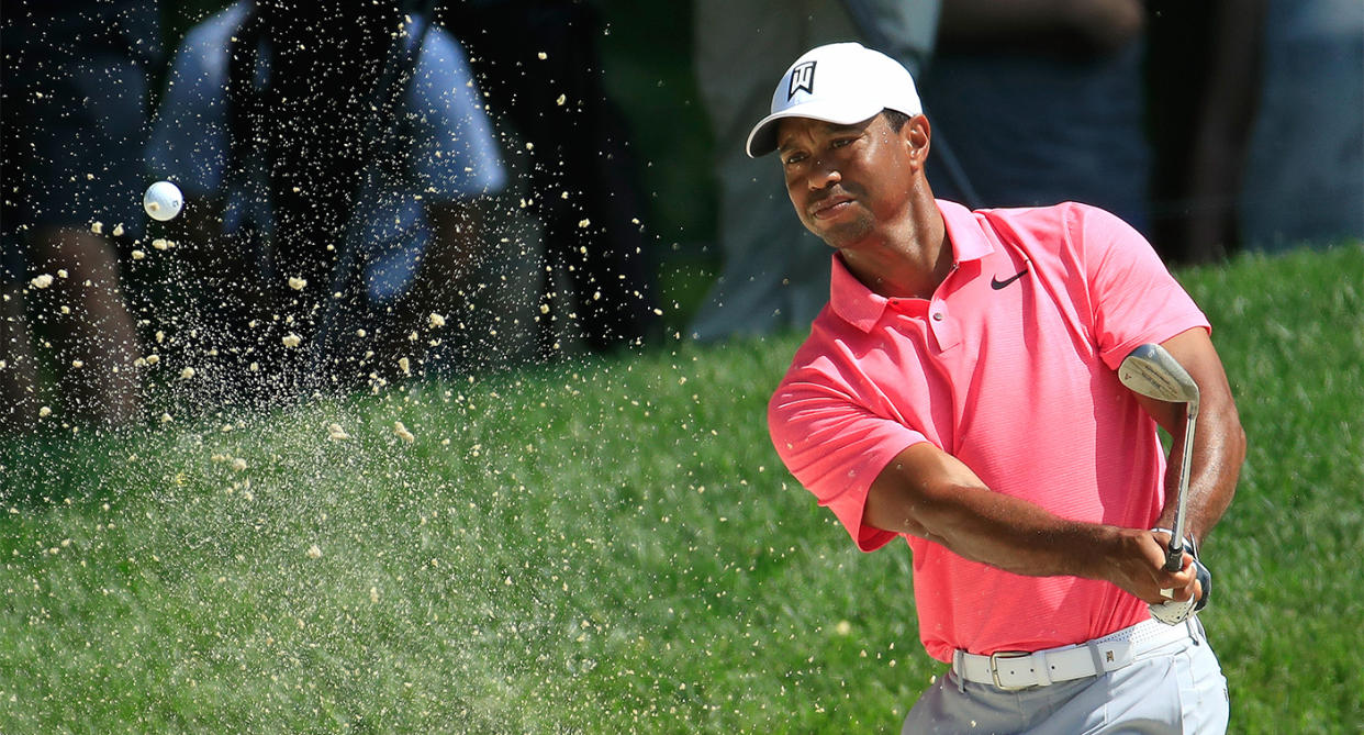 Tiger Woods shot 5-under on the front nine Saturday at the Memorial and had a share of the lead on the back nine. (Getty)