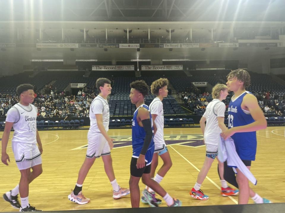 Venture Academy boys basketball and Bear Creek boys basketball shake hands following the Stockton Kings Classic on Saturday, Jan. 14.