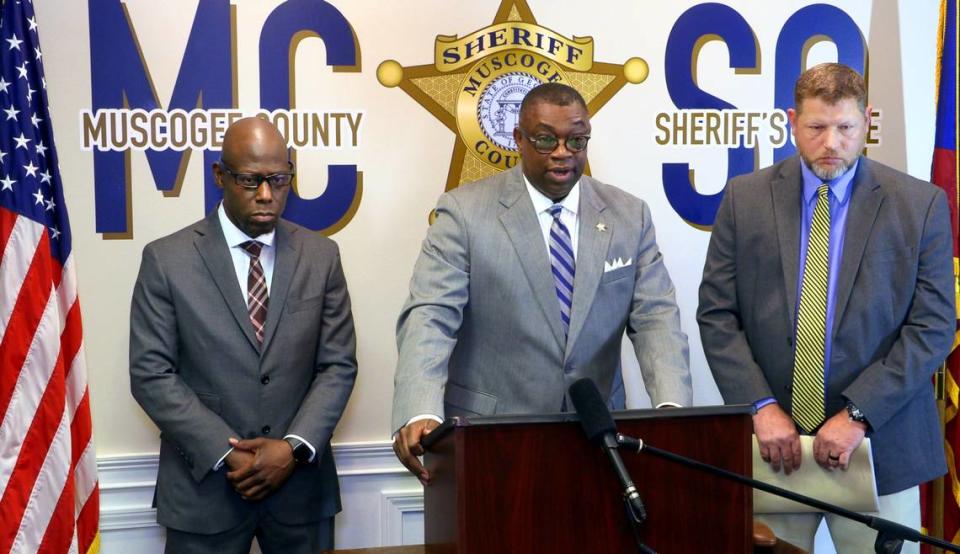 Muscogee County Sheriff Greg Countryman, center, announces that local attorney Allen Jones, 51, was arrested Wednesday for taking packages of drugs and other contraband into the jail, and faces 10 felony counts. Countryman is flanked by District Attorney Stacey Jackson, left, and Michael O’Keefe, an investigator with the Muscogee County Sheriff’s Office. 03/30/2023