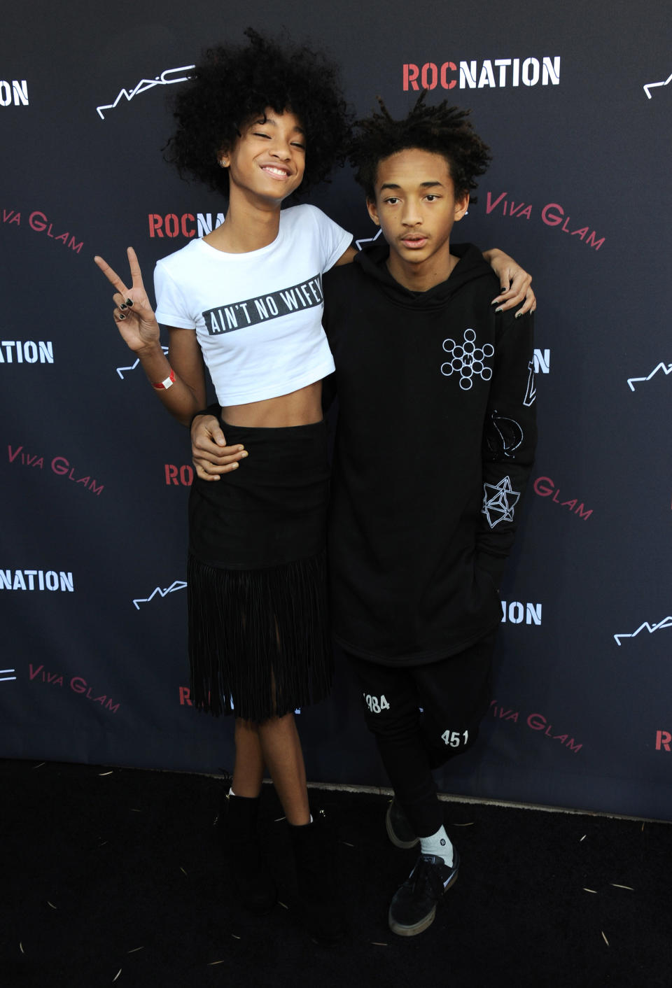 Willow Smith, left, and her brother Jaden Smith arrive at the Roc Nation 2014 Pre-Grammy Brunch Celebration on Saturday, Jan. 25, 2014 in Los Angeles. (Photo by Jordan Strauss/Invision/AP)