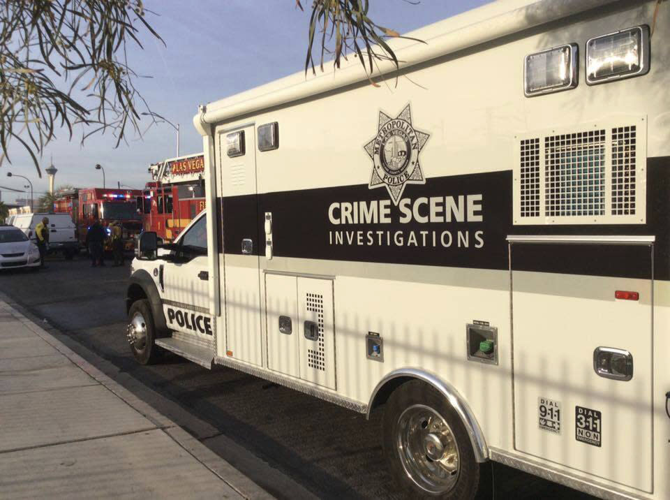 This photo provided by the Las Vegas Fire Department, firefighters work the scene of a fire at a three-story apartment complex early Saturday, Dec. 21, 2019 in Las Vegas. The fire was in first-floor unit of the Alpine Motel Apartments and its cause was under investigation, the department said. Authorities say multiple fatalities were reported and several were injured. (Las Vegas Fire Department via AP)