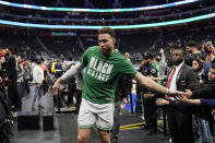 Boston Celtics forward Blake Griffin greets fans after the second half of an NBA basketball game against the Detroit Pistons, Monday, Feb. 6, 2023, in Detroit. (AP Photo/Carlos Osorio)