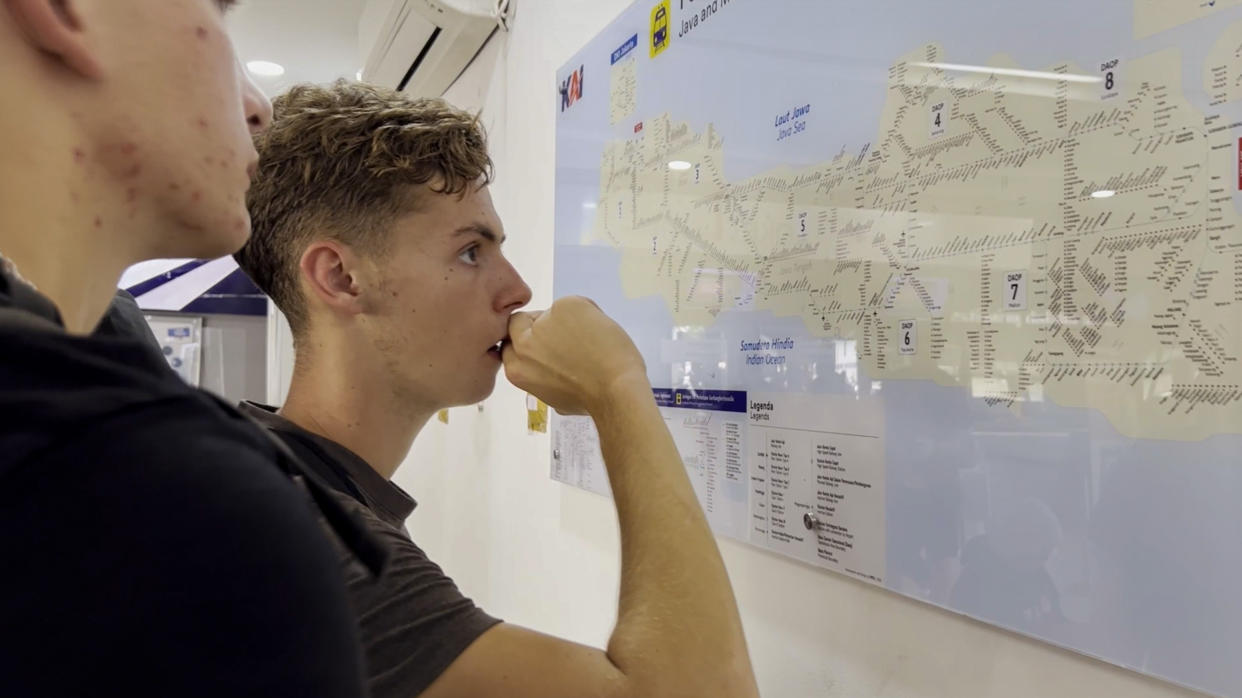 Race Across The World's Alfie and Owen examine the final route. (Studio Lambert)