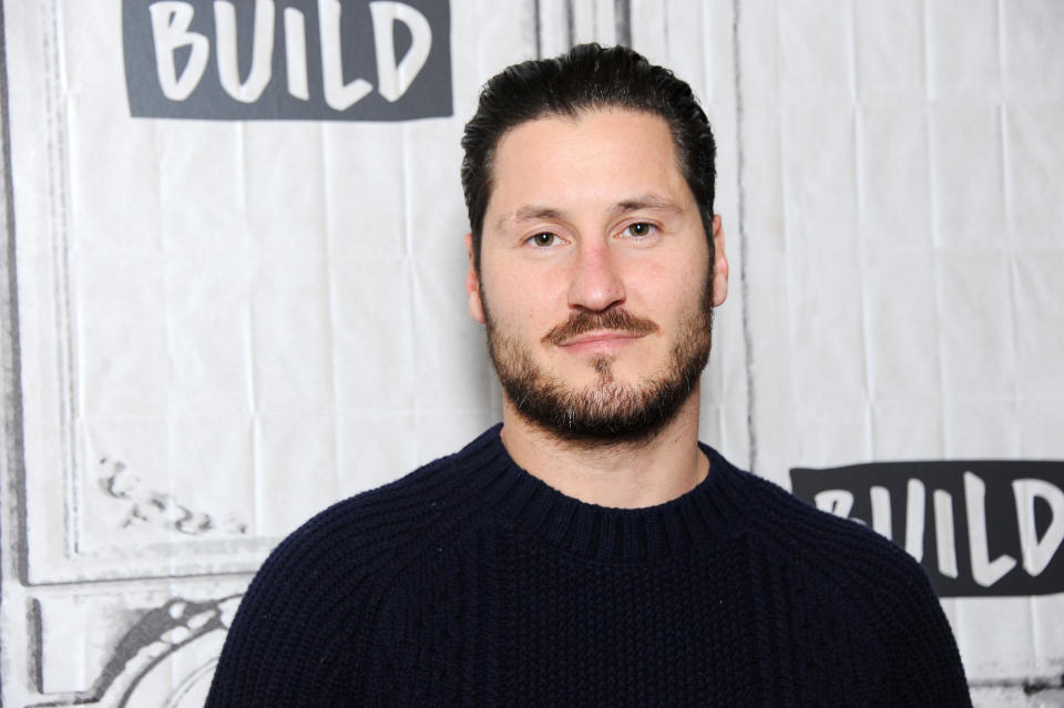 &#39;Dancing With the Stars&#39; pro Val Chmerkovskiy supports Ukraine during a protest in Hollywood as his brother Maks updates his followers on the Ukraine-Russia conflict from the ground. (Photo: Desiree Navarro/WireImage)