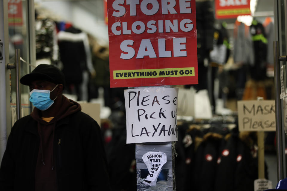 Sale signs are displayed in the window of a business in Brooklyn, New York, on Dec. 1, 2020. Businesses continue to struggle as unemployment remains high and more shoppers have migrated to online shopping.  (Photo: Spencer Platt via Getty Images)