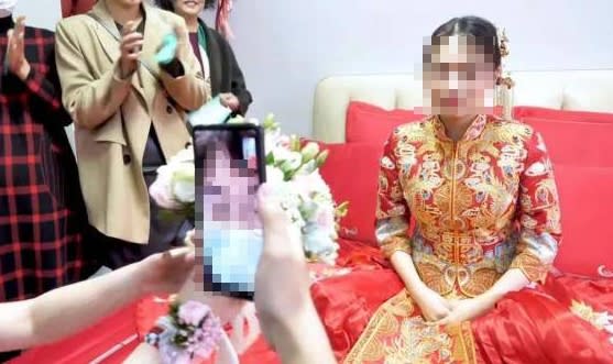 一對情侶本來要在今年5月結婚，卻因疫情影響被迫延期。（圖／翻攝自光明網）