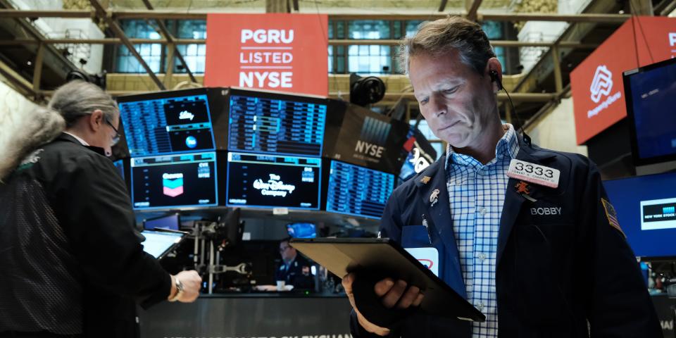 Traders work on the floor of the New York Stock Exchange (NYSE) on March 18, 2022 in New York City.