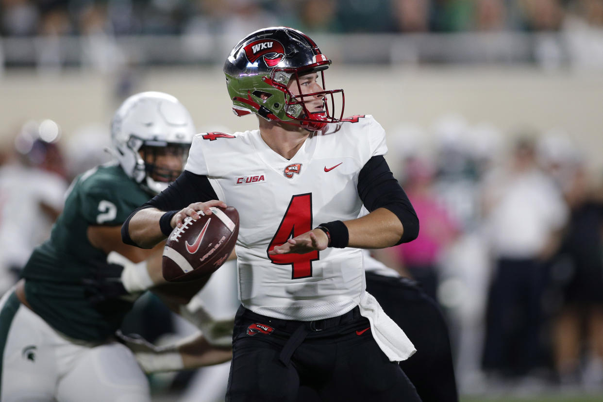 Western Kentucky quarterback Bailey Zappe looks to throw during an NCAA college football game against Michigan State, Saturday, Oct. 2, 2021, in East Lansing, Mich. (AP Photo/Al Goldis)