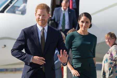 Britain's Prince Harry and his wife Meghan, the Duke and Duchess of Sussex, arrive at Dublin City Airport for a two-day visit to Dublin, Ireland July 10, 2018. Dominic Lipinski/Pool via REUTERS