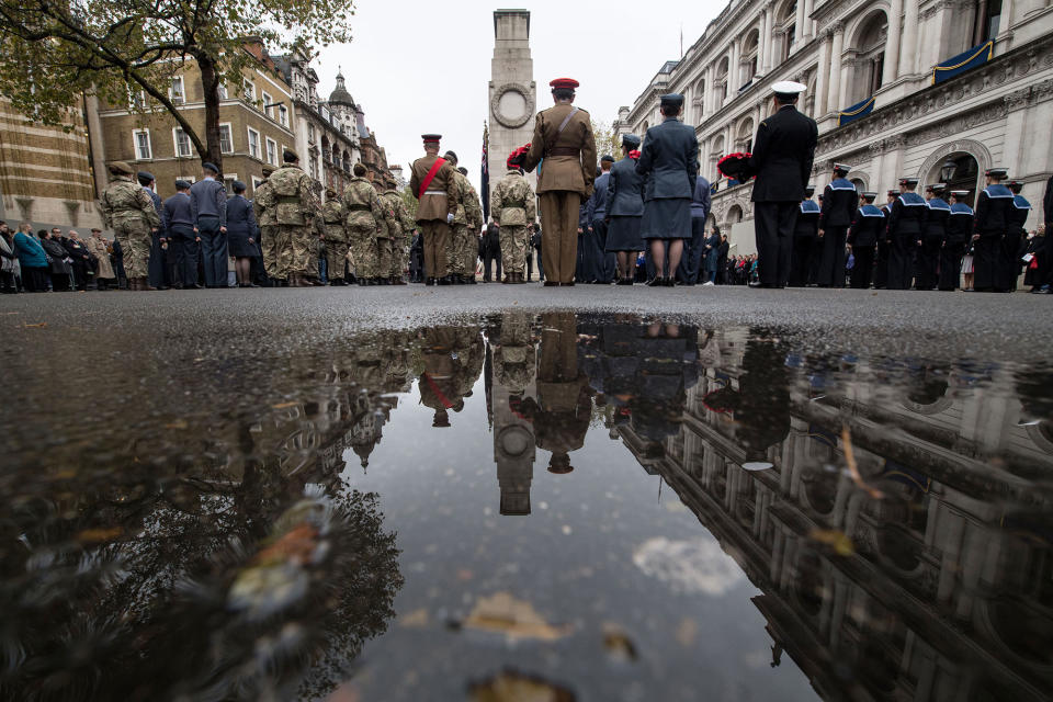 <p>Army, navy and RAF cadets stand to attention after a two-minute silence during the Western Front Association’s (WFA) annual service of remembrance on Armistice Day, at the Cenotaph in central London on Nov. 11, 2017. (Photo: Chris J. Ratcliffe/AFP/Getty Images) </p>