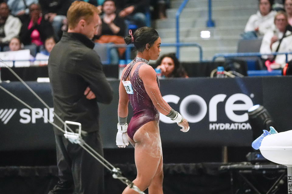 Gabby Douglas steps away from the uneven bars during the U.S. Classic gymnastics event Saturday, May 18, 2024, in Hartford, Conn. (AP Photo/Bryan Woolston)