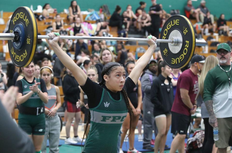 Flagler Palm Coast High's Nya Williams makes a lift, Thursday February 1, 2024 during girls weightlifting regionals at Flagler Palm Coast High School.