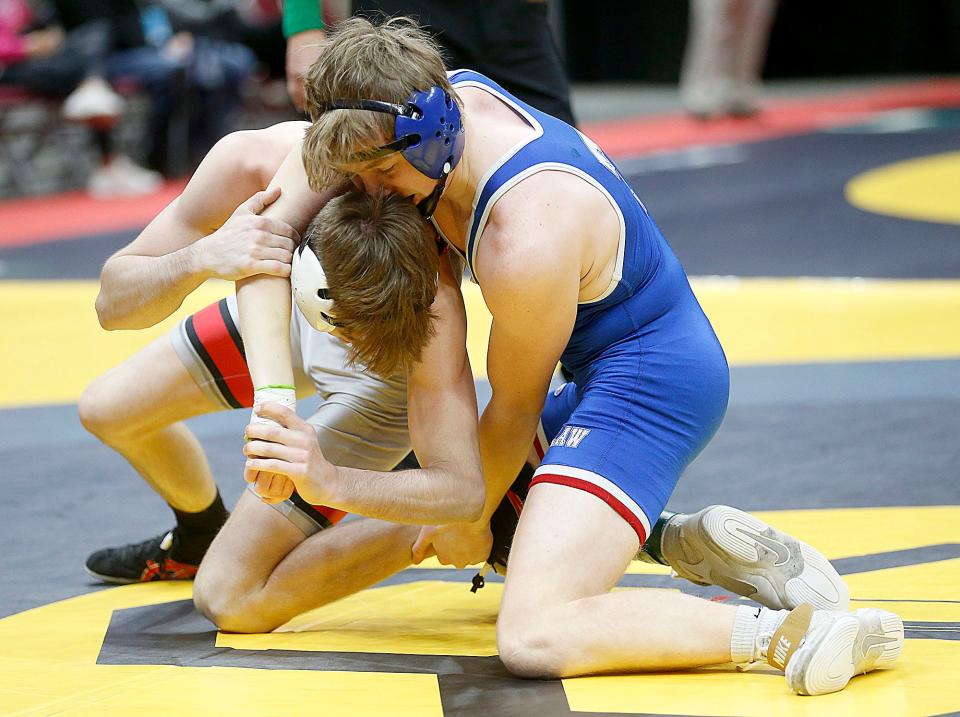 Crestview's Hayden Kuhn wrestles Tuslaw's Maxwell Cooper during their 144 lbs. match at the OHSAA State Wrestling Championships Sunday, March 12, 2023 at the Jerome Schottenstein Center. . TOM E. PUSKAR/ASHLAND TIMES-GAZETTE