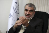 In this Nov. 9, 2019, photo, Abbas Ali Kadkhodaei, a prominent member of Iran's powerful Guardian Council, speaks in an interview with The Associated Press, in Tehran, Iran. A prominent member of Iran’s powerful Guardian Council has told The Associated Press that the Islamic Republic should stop honoring the terms of its collapsing 2015 nuclear deal with world powers amid tensions with the U.S. (AP Photo/Vahid Salemi)