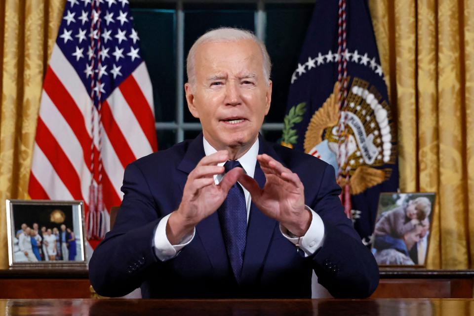 US President Joe Biden addresses the nation on the conflict between Israel and Gaza and the Russian invasion of Ukraine from the Oval Office of the White House in Washington, DC, on October 19, 2023. President Joe Biden will deliver a rare Oval Office speech October 19, 2023 urging Americans to back military aid for Israel and Ukraine at what he calls a perilous moment for democracy around the globe.