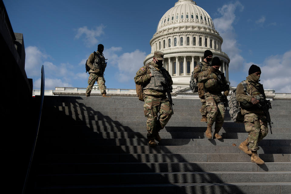 Members of the National Guard patrol the grounds of the U.S. Capitol on March 4, 2021, in Washington, D.C., after the FBI and Homeland Security Department warned that violent militia groups and QAnon followers had discussed attacking the legislature that day. (Photo: BRENDAN SMIALOWSKI via Getty Images)