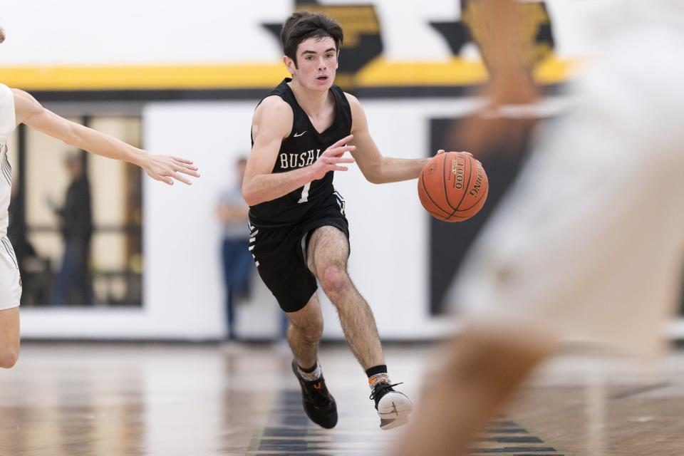Bushland Falcon’s Cole Purcell (1) dribbles down the court during an away game against the Canadian Wildcats on Friday, January 14, 2022 at Canadian High School.