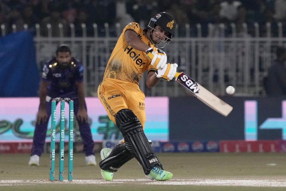 Peshawar Zalmi' Saim Ayub plays a shot during the Pakistan Super League T20 cricket match between Peshawar Zalmi and Quetta Gladiators, in Rawalpindi, Pakistan, Friday, March 8, 2024. (AP Photo/Anjum Naveed)