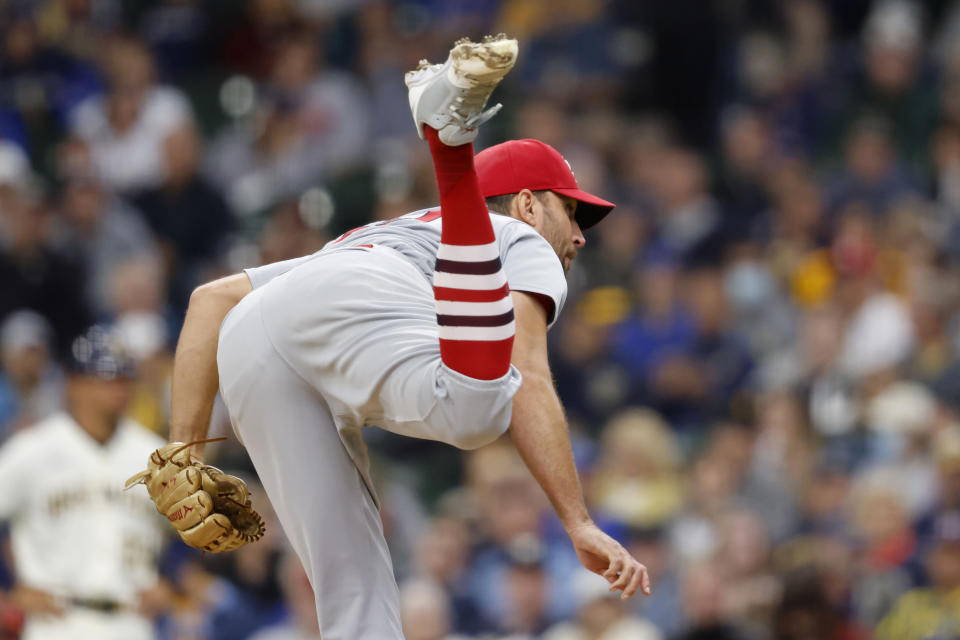 St. Louis Cardinals starting pitcher Adam Wainwright watches his strike out of Milwaukee Brewers' Luis Urias for his career 2,000th strikeout during the fourth inning of a baseball game Thursday, Sept. 23, 2021, in Milwaukee. (AP Photo/Jeffrey Phelps)