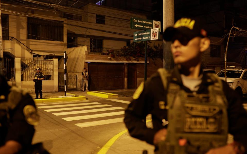 Police guard outside President Dina Boluarte's house