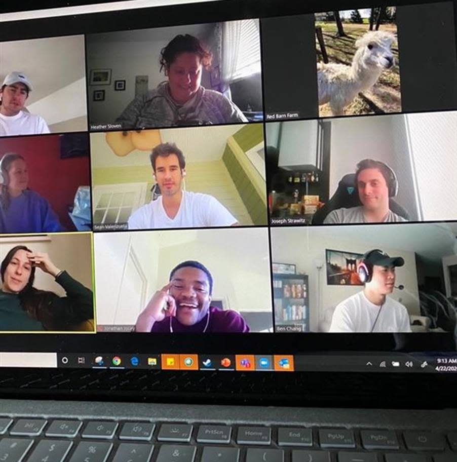 A LinkedIn team is surprised mid-meeting with the Red Barn Farm alpacas. (Photo: Heather Sloven)