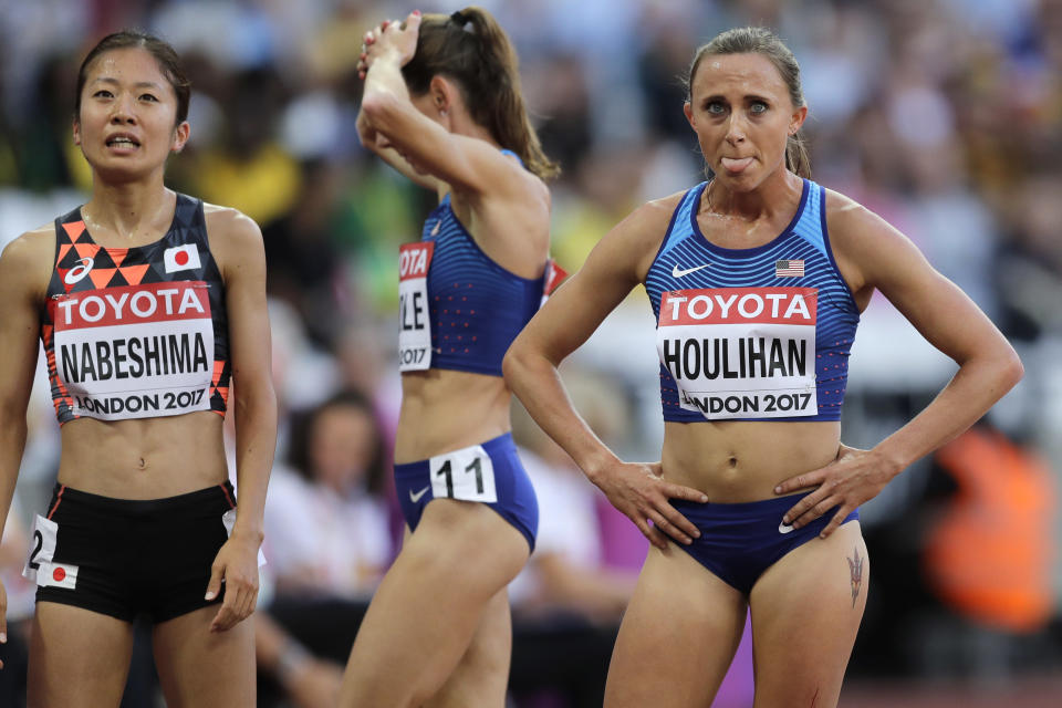 FILE - United States' Shelby Houlihan, right, reacts after finishing a women's 5000m heat during the World Athletics Championships in London, in this Thursday, Aug. 10, 2017, file photo. Banned runner Shelby Houlihan is in the lineup and will be allowed to run at U.S. Olympic track trials while any appeals she files are pending. The American record holder at 1,500 and 5,000 meters, Houlihan is on the start list for Friday’s, June 18, 2021, 5,000 preliminaries. (AP Photo/Tim Ireland, File)