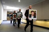 FILE PHOTO: Family members of victims attend as Boeing's Muilenburg testifies before Senate hearing on grounded 737 MAX on Capitol Hill in Washington