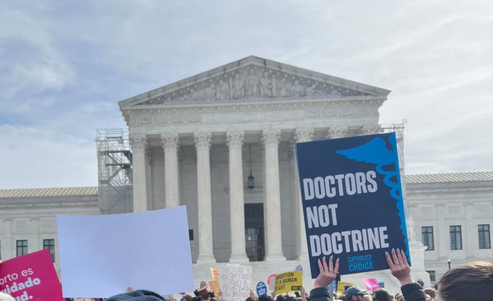 A  pro-choice demonstrator holds a sign that reads, “Doctors not doctrine.” (Katie Hawkinson/The Independent)