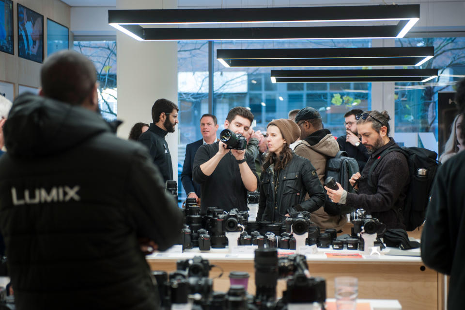 Photo of Wex Photo Video Putney showing staff member interacting with a customer